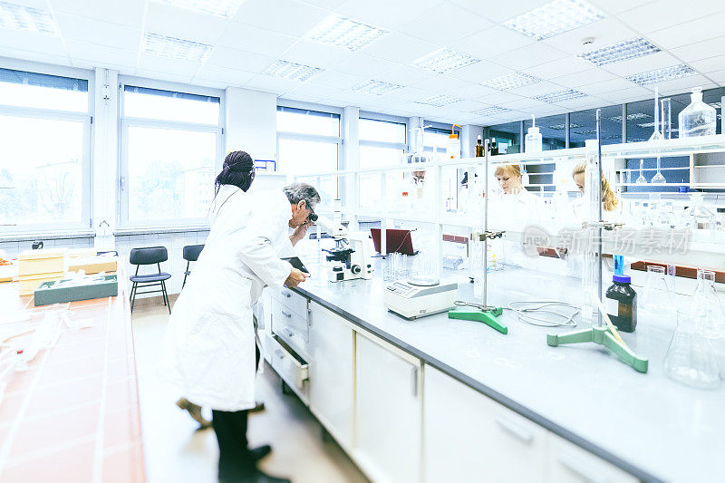 Group of scientists working in laboratory